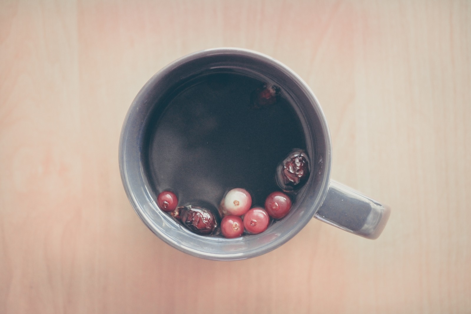 Image of berries in a tea cup